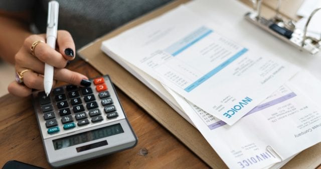 a woman organizing her finances