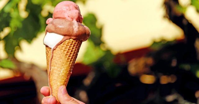 an ice cream cone melting - a great way to keep cool during the heat of the summer.