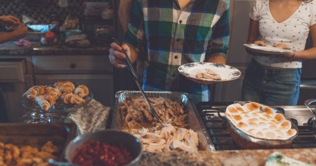 a family in charlotte, nc enjoying a thanksgiving dinner