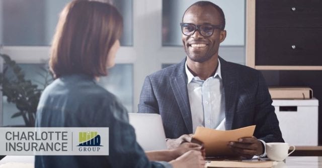 a woman meeting with her independent insurance agent