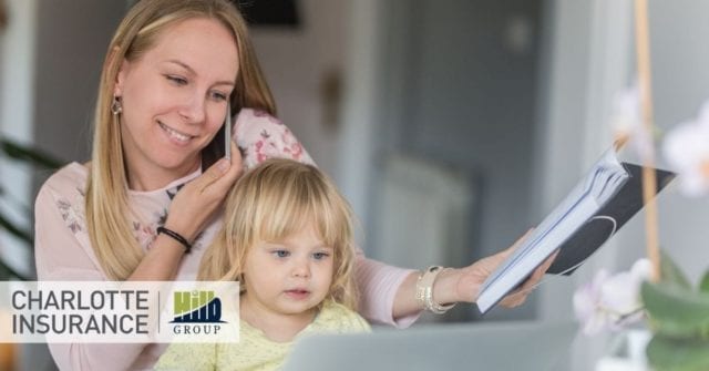 a mother running her home based business with her daughter in her lap amidst the covid-19 pandemic