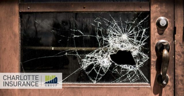 broken window during a time of civil unrest