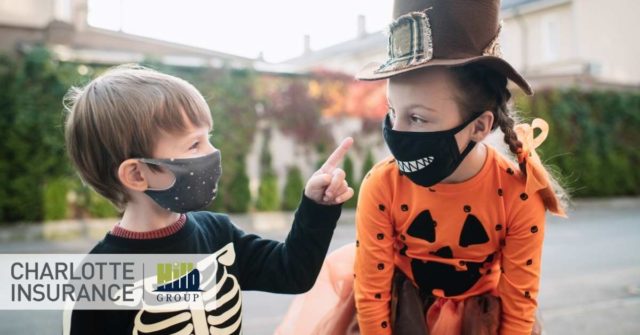 2 kids celebrating Halloween safely during COVID-19