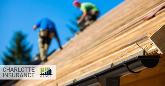 contractors replacing the roof on a house