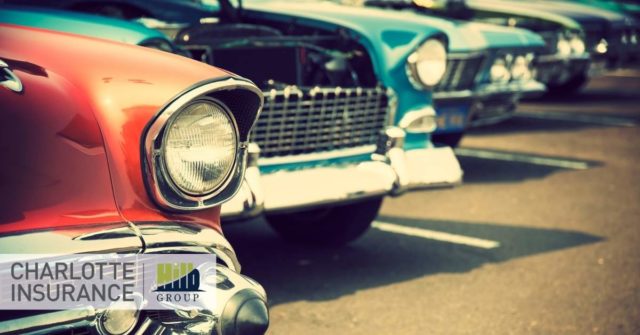 a row of classic cars that are protected with the right classic car insurance policy