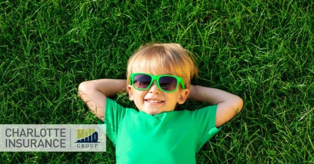 a child on a lawn celebrating Earth Day 2021 in Charlotte