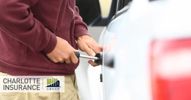 a thief attempting to break into a car