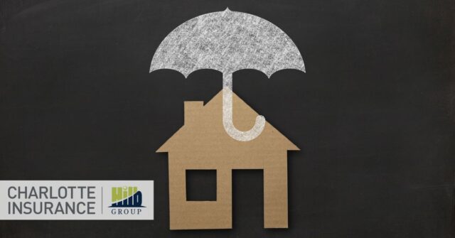 an illustration of a home being protected by an umbrella insurance policy