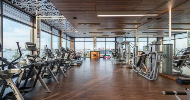 a gym inside of an HOA / Condo that is covered with the proper insurance: www.pexels.comphotovarious-fitness-machines-in-modern-spacious-gym-7031706 (1)